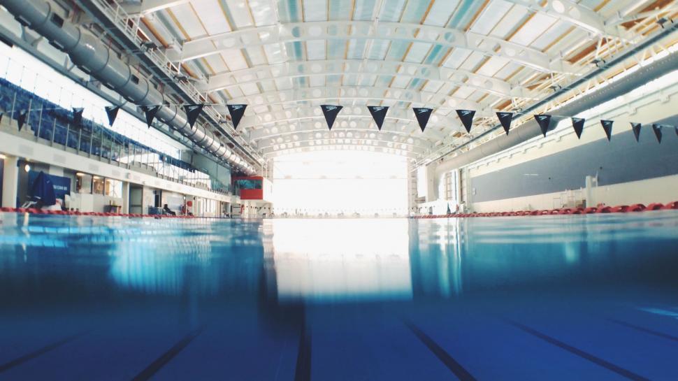 Free Image of Indoor Swimming Pool With Blue Water 