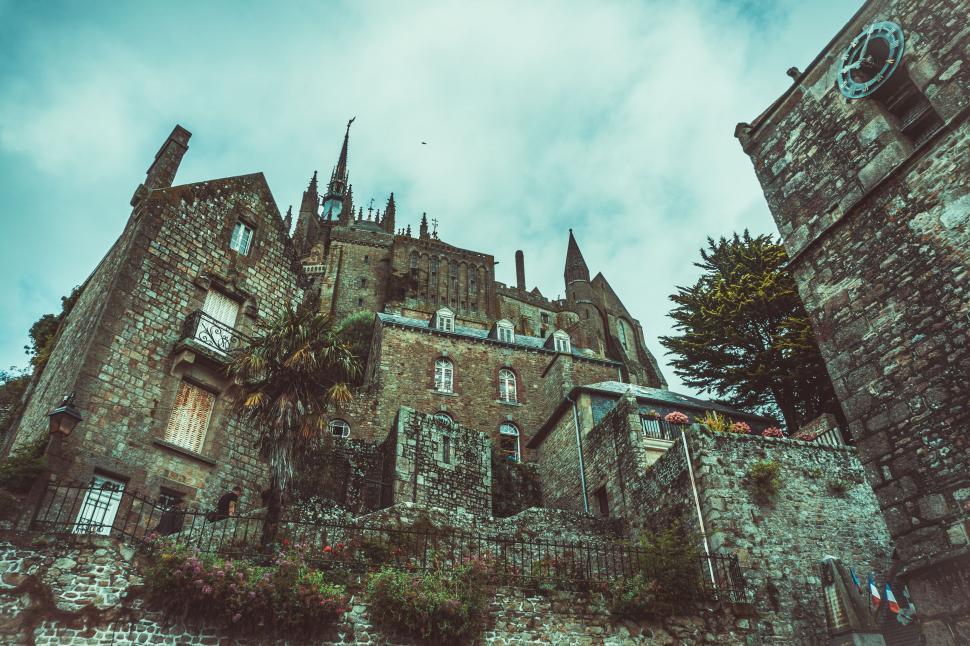 Free Image of Ancient Castle With Clock Tower 