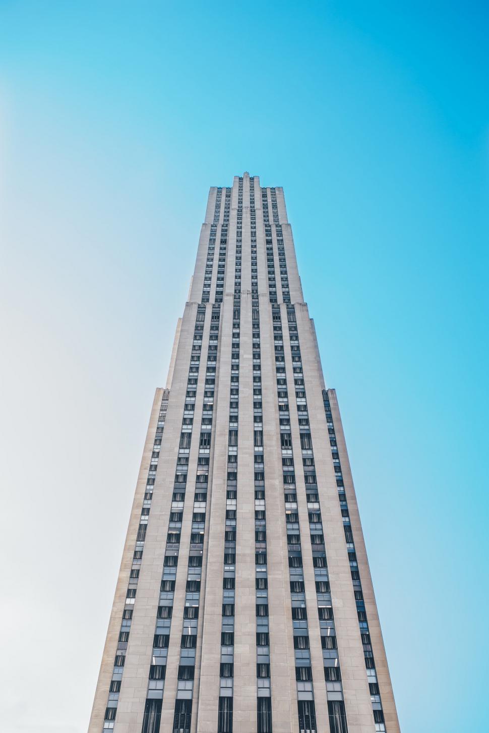 Free Image of Towering Skyscraper Against Sky 