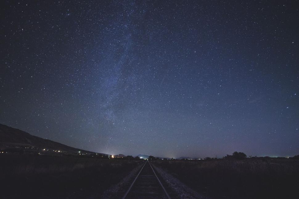 Free Image of Train Track Under Starry Sky 