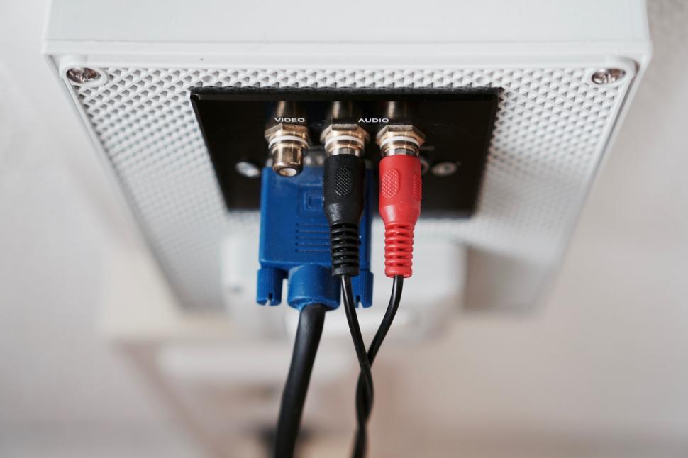 Free Image of Plugged Wires in Wall Outlet 