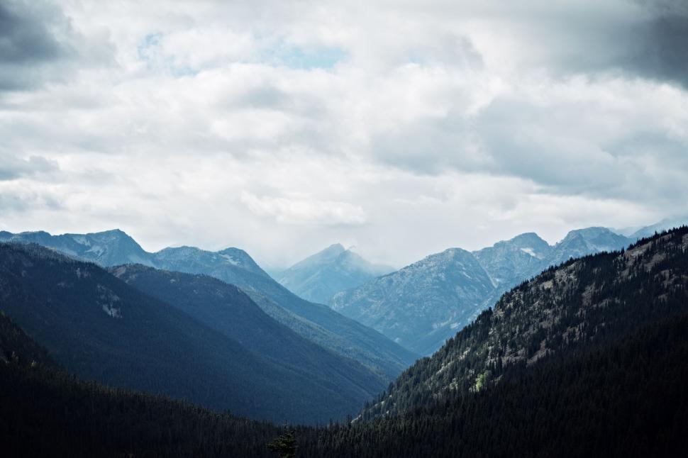 Free Image of Clouds Covering Mountain Range 