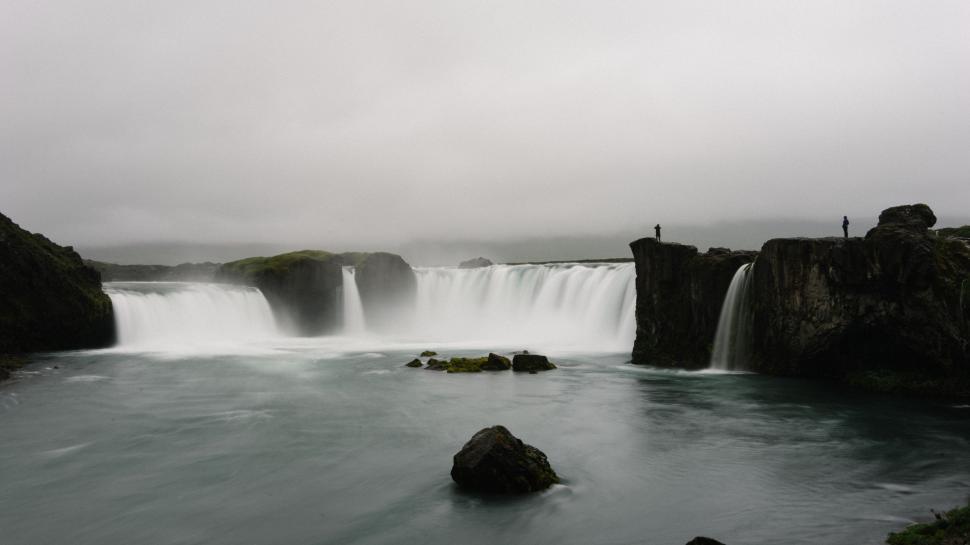 Free Image of Majestic Waterfall Cascading in Black and White 