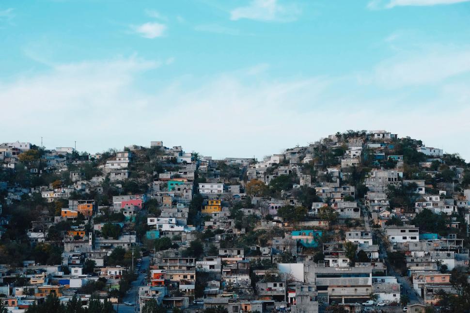 Free Image of Bustling Cityscape With Numerous Houses 