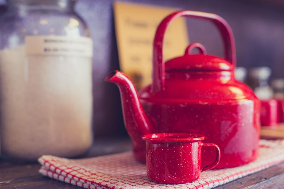 Free Image of Red Teapot on Wooden Table 