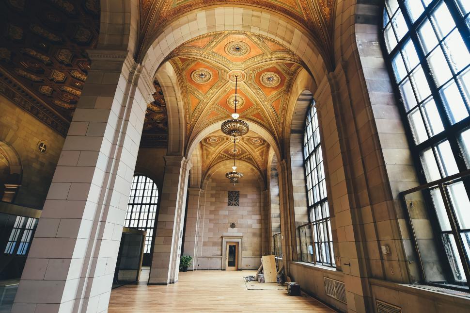 Free Image of Large Building Featuring Many Windows and Ceiling 