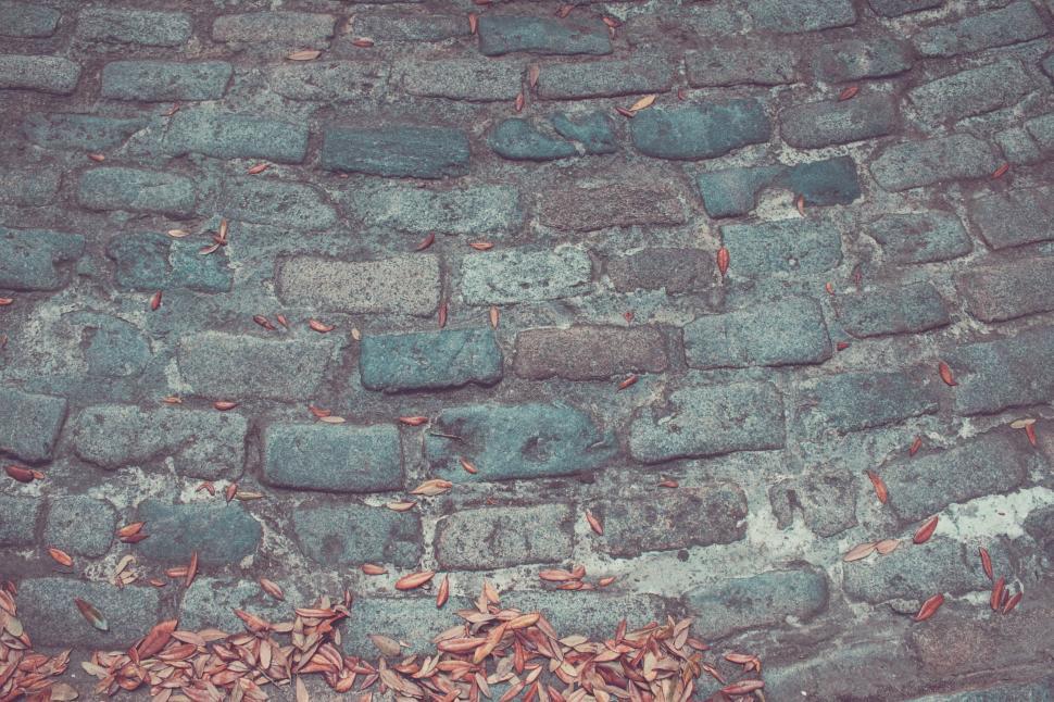 Free Image of Red Fire Hydrant by Brick Wall 