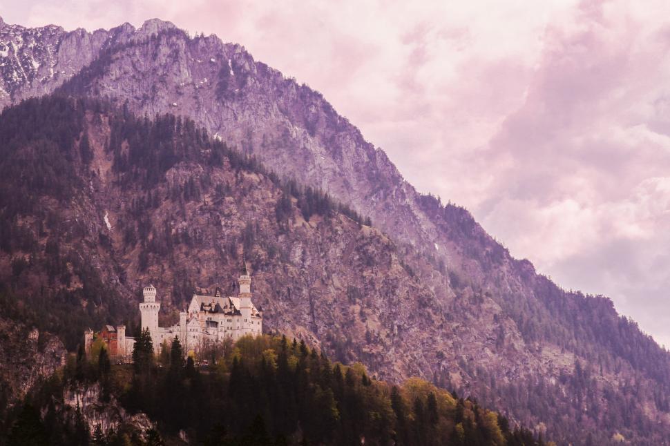 Free Image of Castle Amidst Mountain Range 