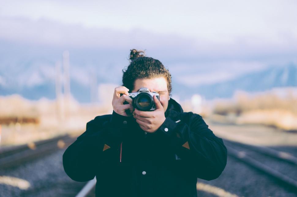 Free Image of Man Taking Selfie With Camera 