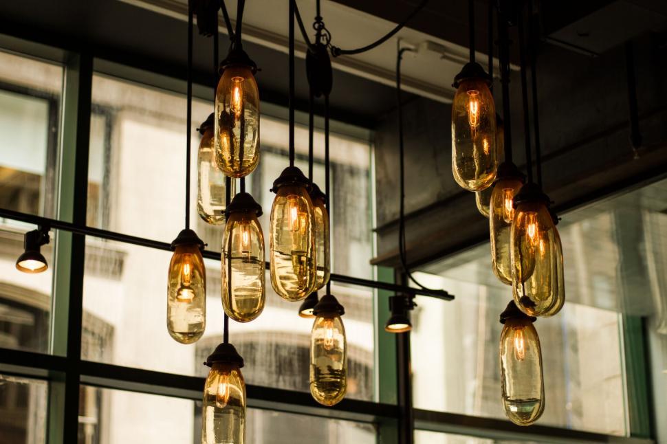 Free Image of Hanging Lights Illuminating a Room 