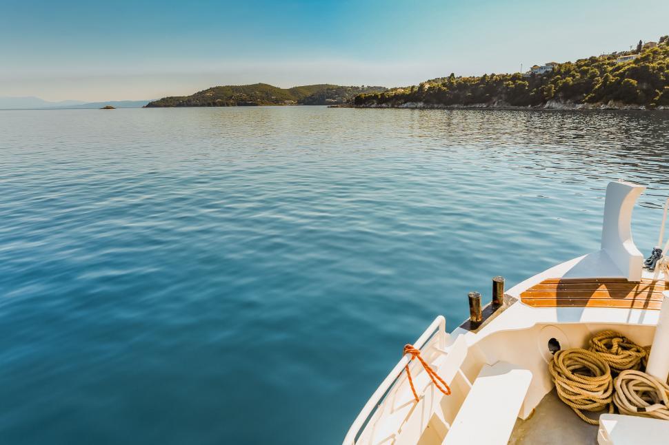 Free Image of Boat Floating in the Middle of a Lake 
