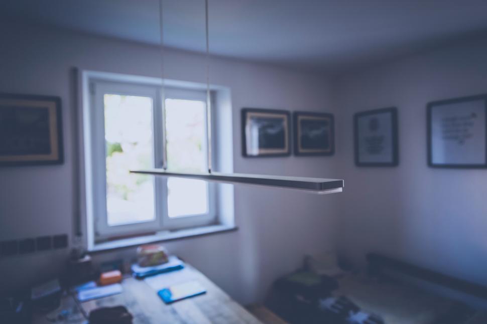 Free Image of Room With Table and Pictures on Wall 