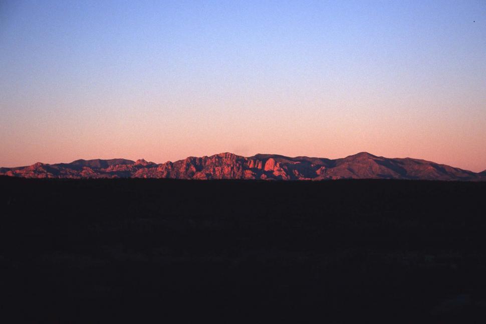 Free Image of Warm light on distant mountains 