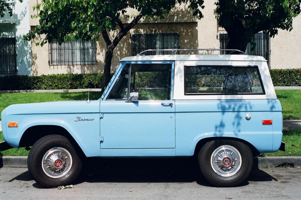 Free Image of Light Blue Truck Parked in Parking Lot 