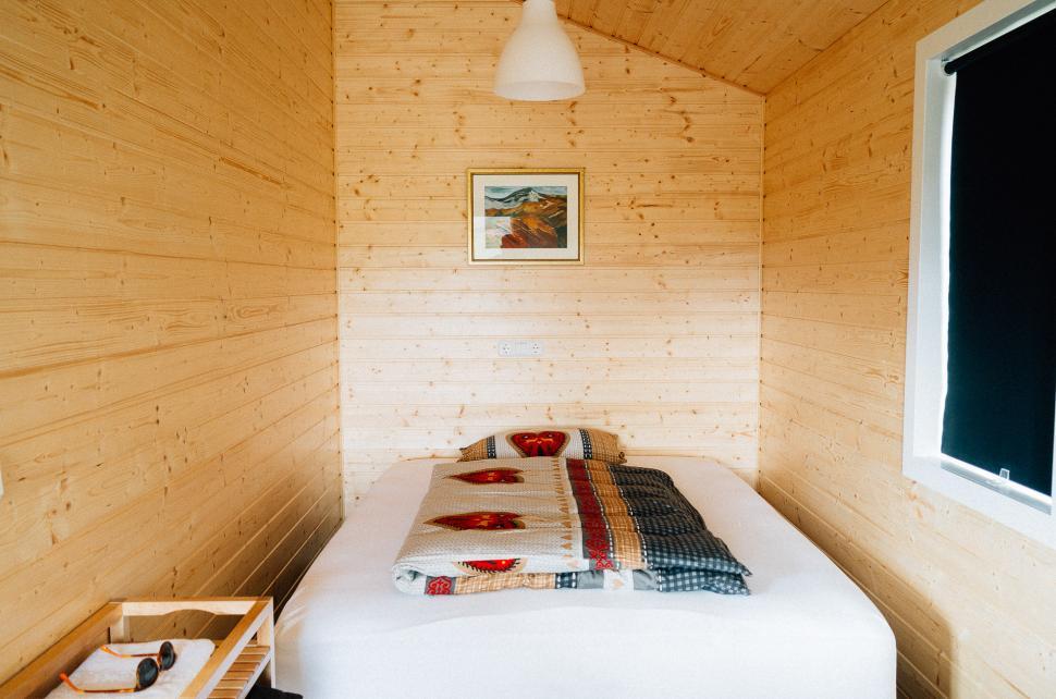 Free Image of Small Bedroom With Bed and Window 