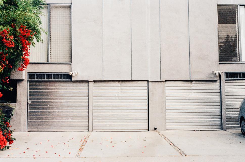 Free Image of Car Parked in Front of Building 