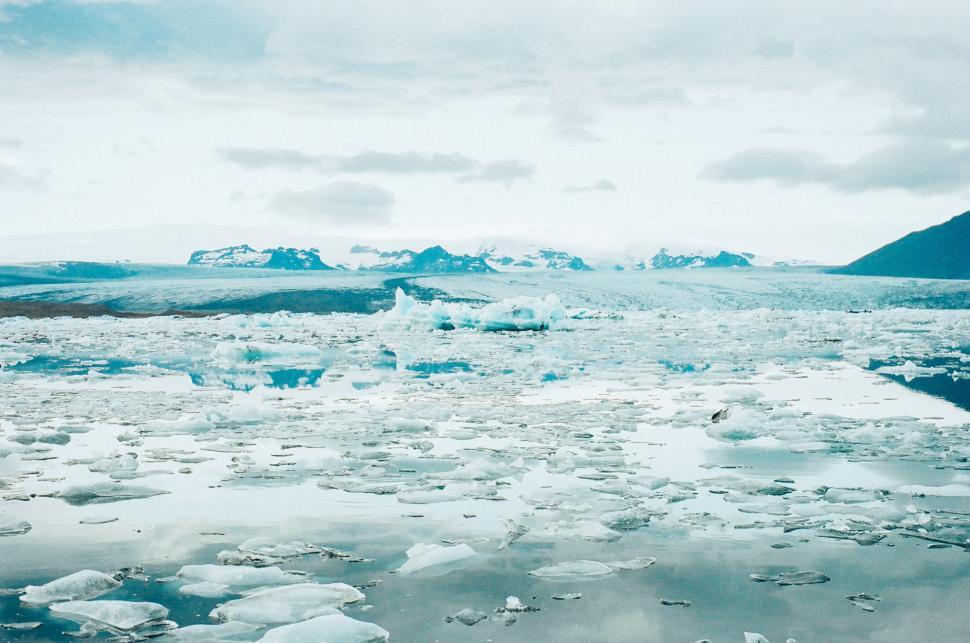 Free Image of Large Amount of Ice Floats on Body of Water 