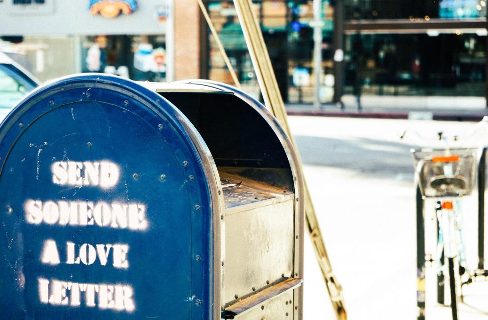 Free Image of Blue Mailbox on Side of Road 