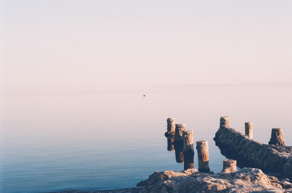 Free Image of Rocky Outcrops in Body of Water 