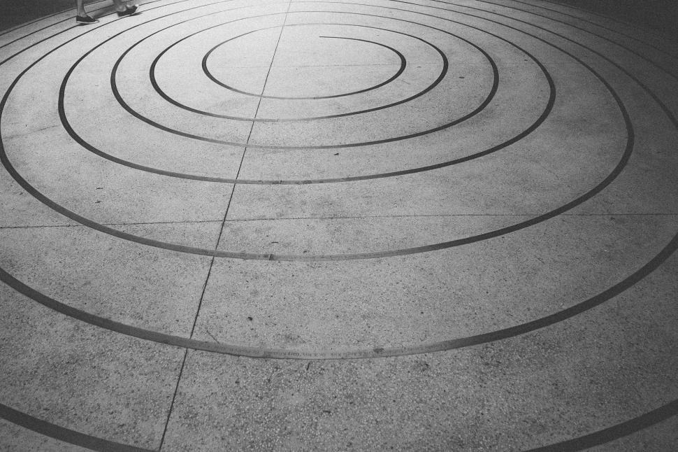 Free Image of Man Skateboarding Down Sidewalk 