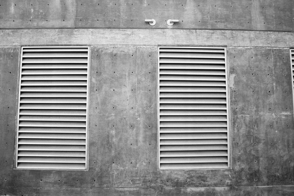 Free Image of Three Windows on a Building 