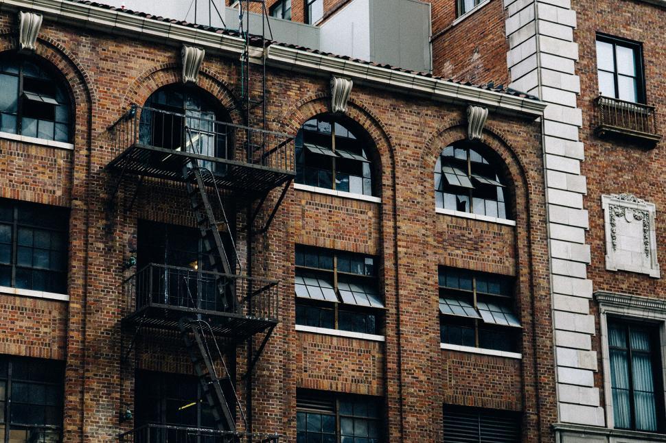 Free Image of Fire Escape on the Side of a Brick Building 