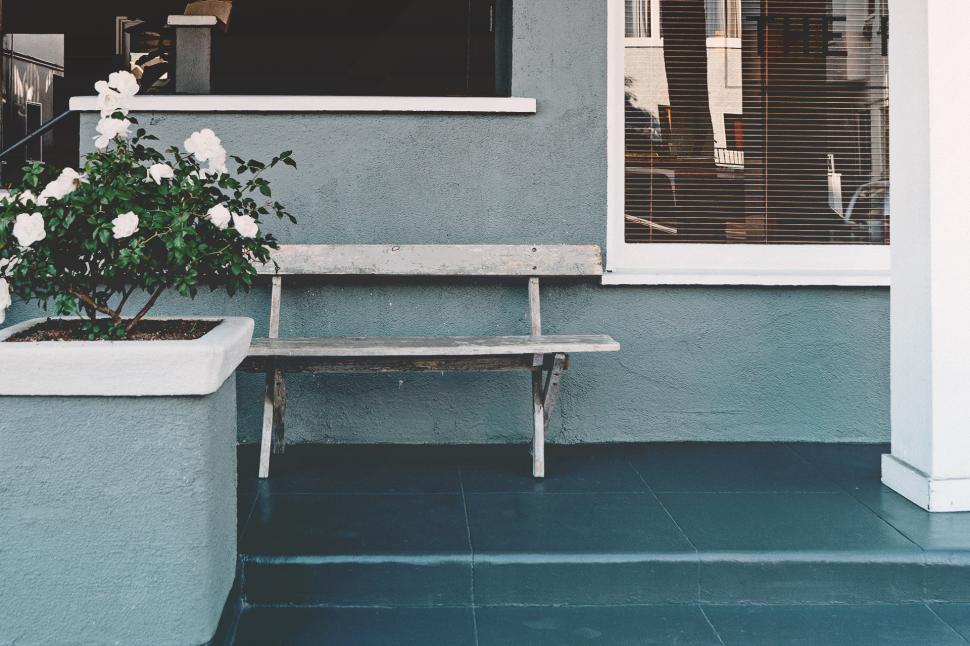Free Image of Wooden Bench in Front of Window 