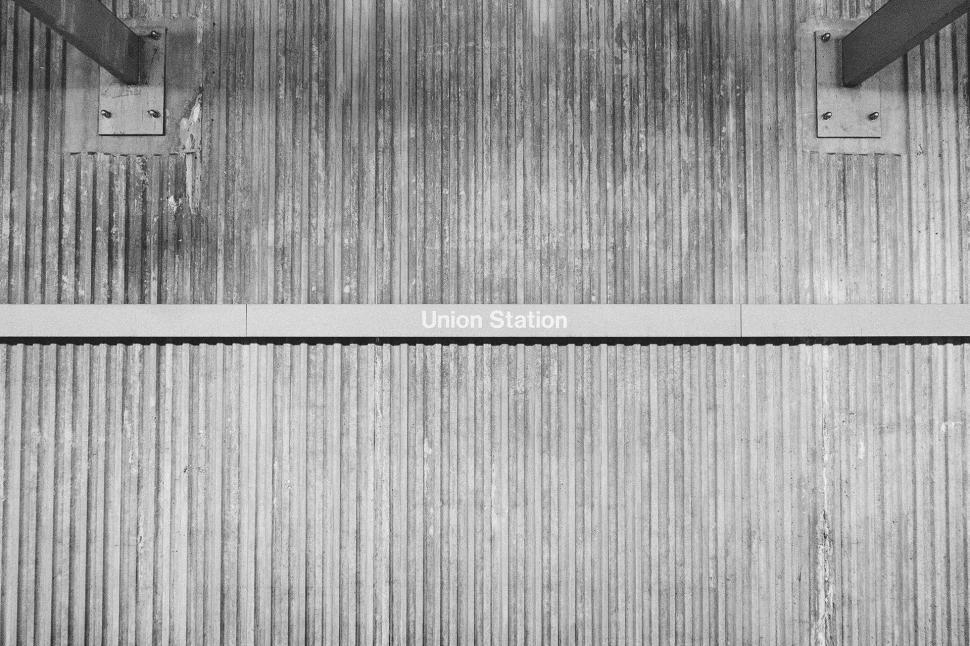 Free Image of Man Riding Skateboard Down Metal Ramp 