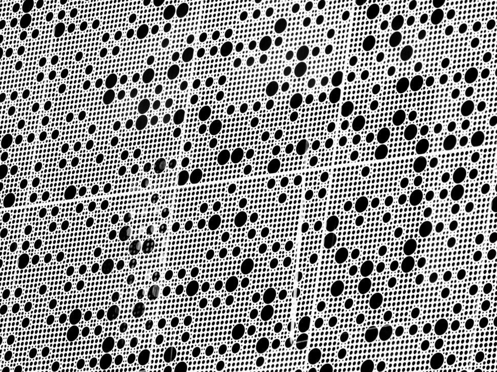 Free Image of Metal Background with Round Holes  