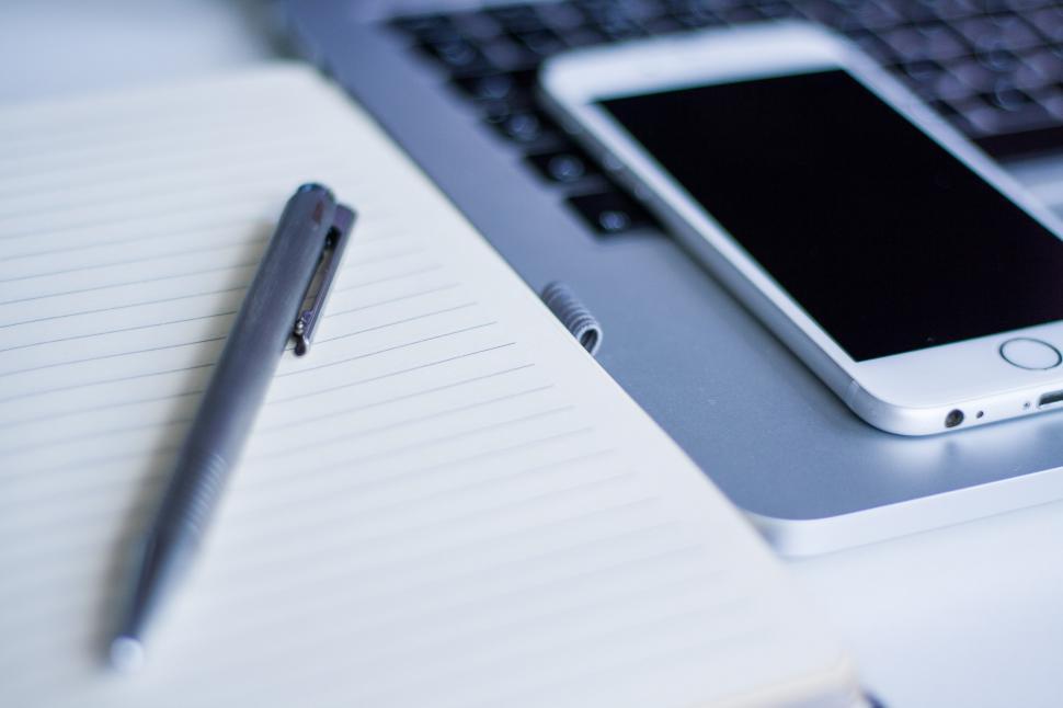 Free Image of Laptop Computer and Pen on Desk 
