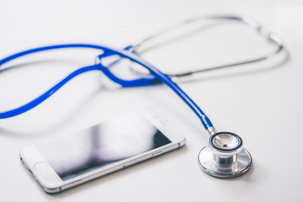 Free Image of Stethoscope and Phone on Table 