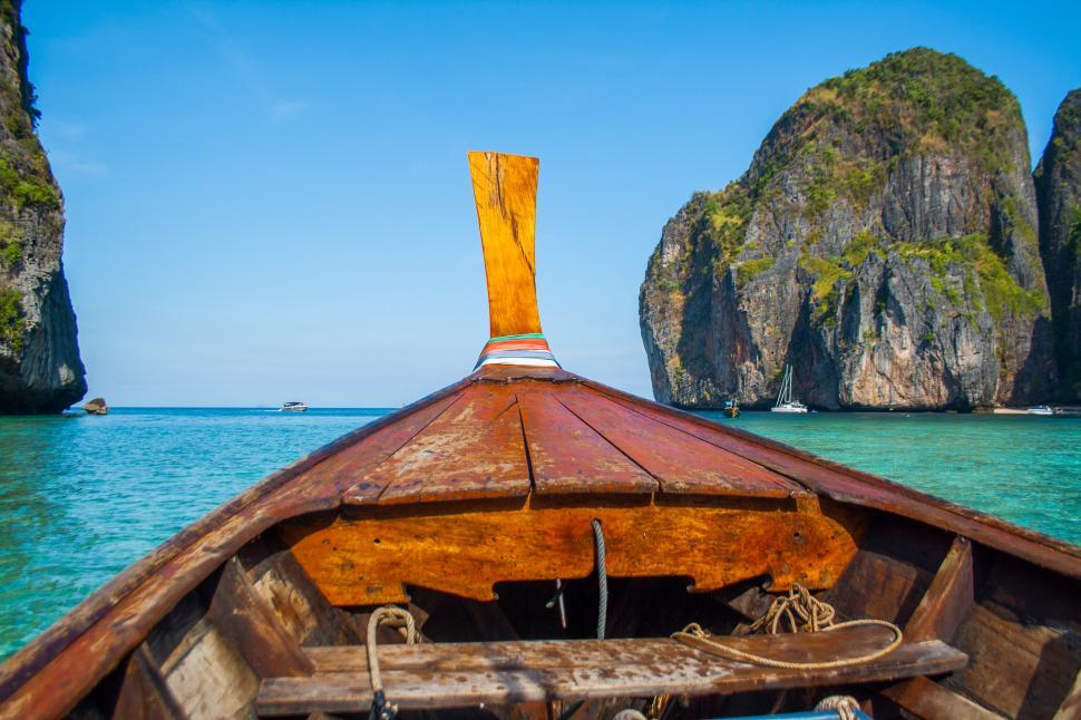 Free Image of Wooden Boat Adrift on Open Water 