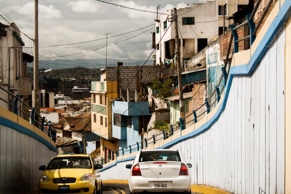 Free Image of Two Cars Parked on a Street 