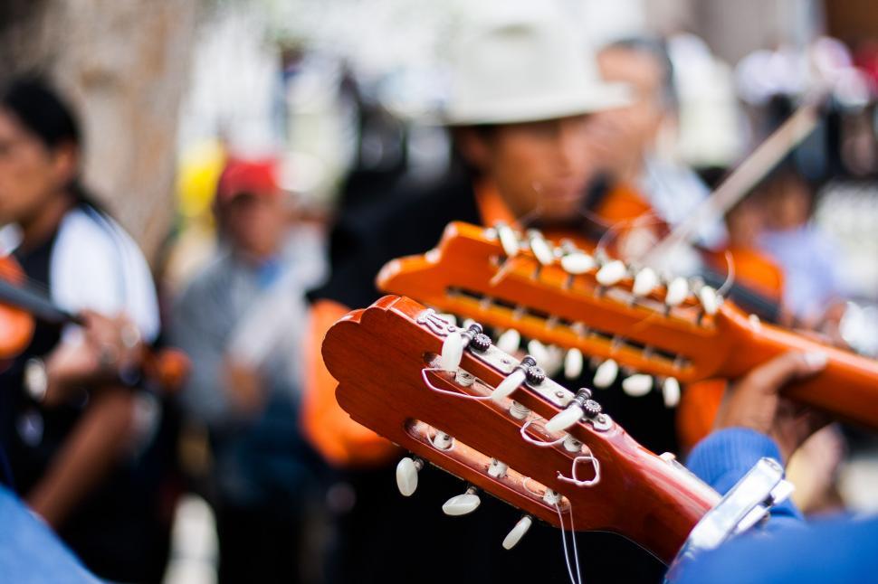 Free Image of Close-Up of Person Playing Guitar 