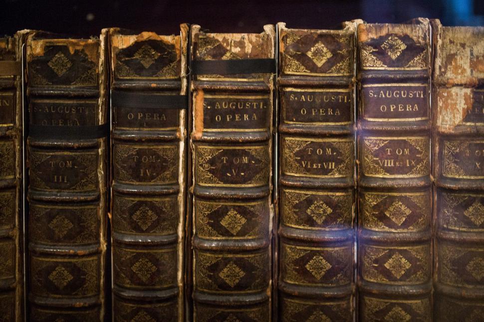 Free Image of Stack of Old Books on Shelf 