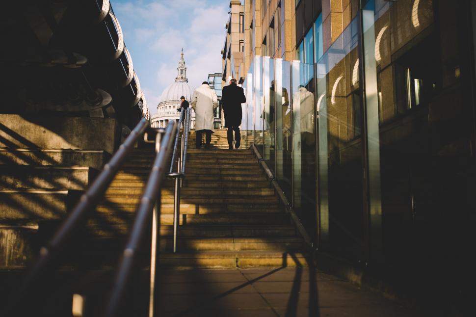 Free Image of Man Walking Up Stairs 