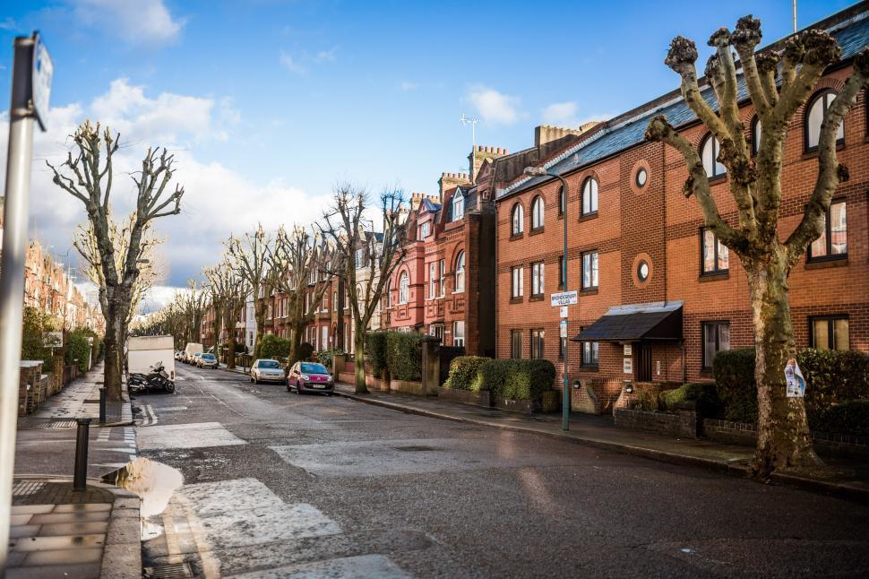 Free Image of Cars Parked Alongside a Street 