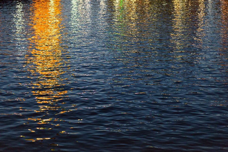 Free Image of Row of Boats Floating on Lake 