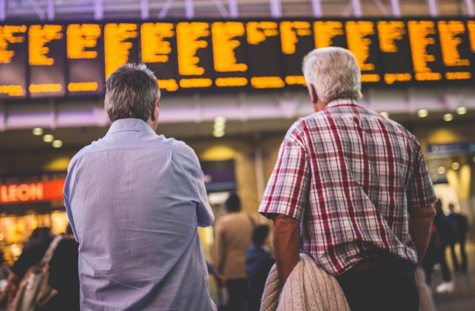Free Image of Two Men Standing Together 