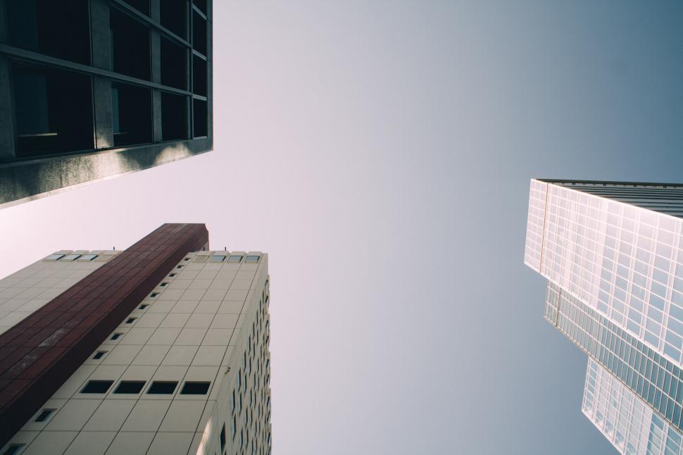 Free Image of Looking Up at Tall Buildings in a City 