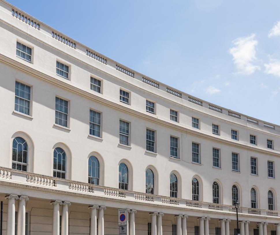 Free Image of Grand White Building With Windows and Columns 