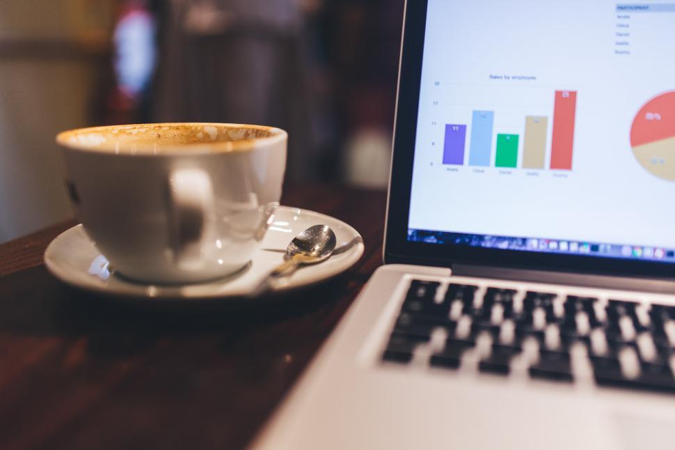 Free Image of Coffee Cup and Laptop on Saucer 
