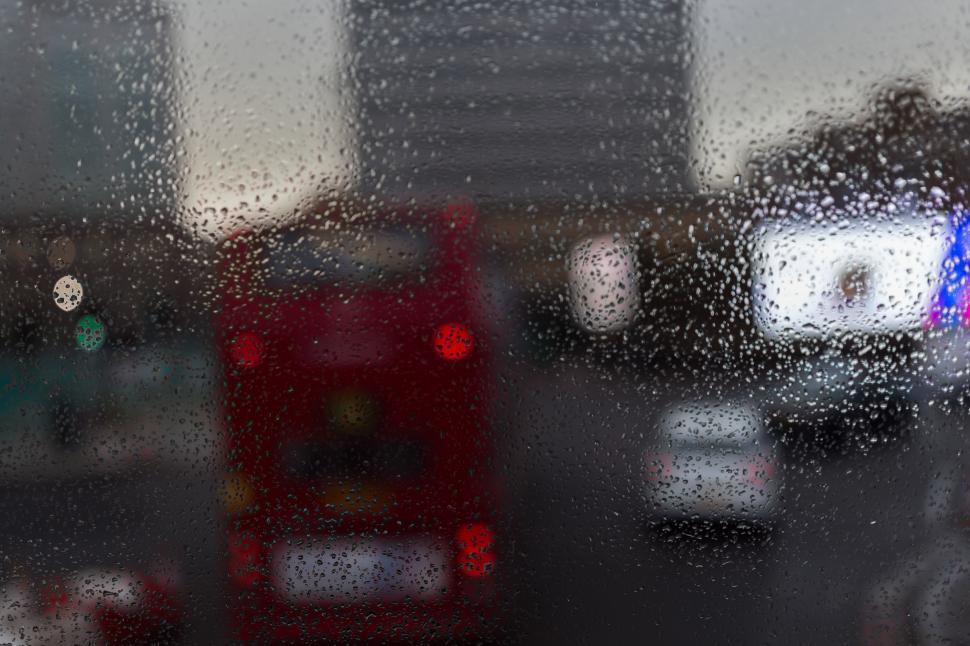 Free Image of Rain Covered Window Showing View of Street 