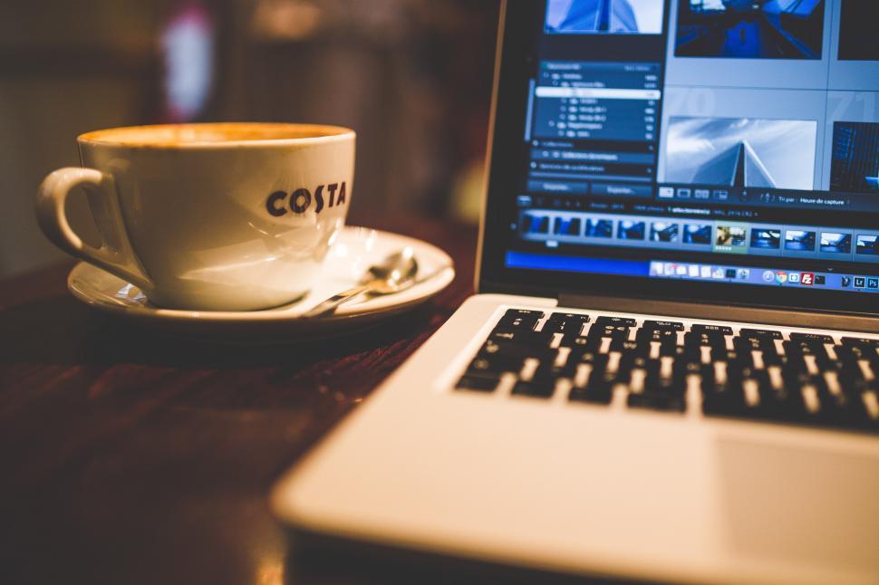 Free Image of Laptop Computer on Wooden Table 