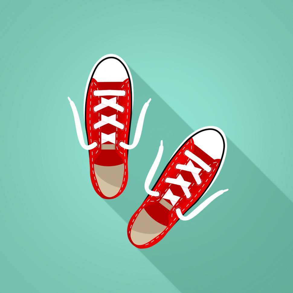 Free Image of Red Sneakers on Turquoise Background 