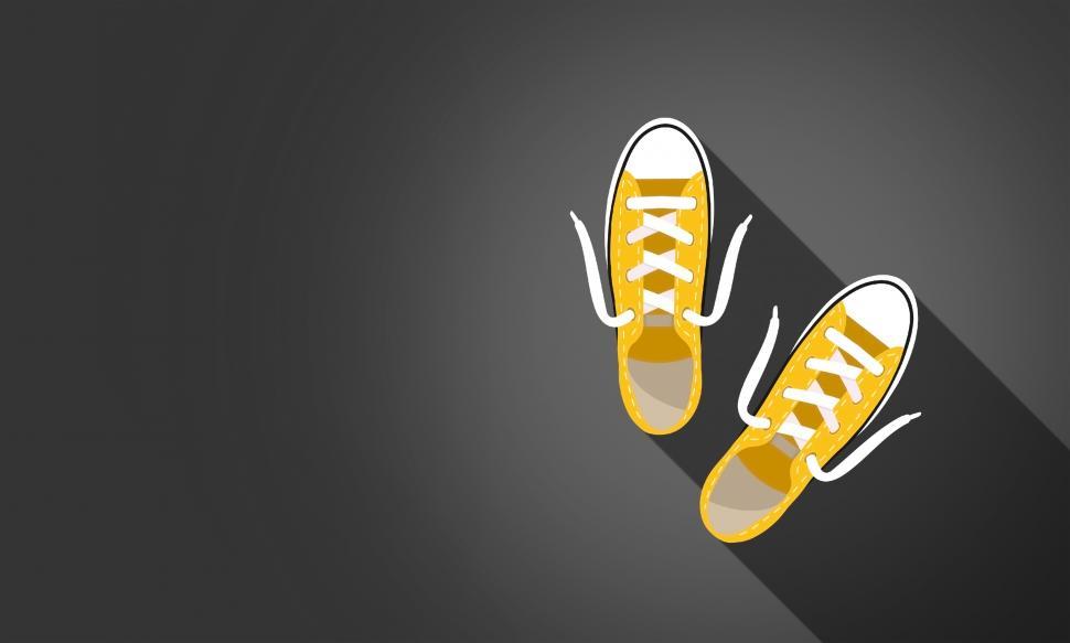 Free Image of Yellow Sneakers on Dark Background - With Copyspace 