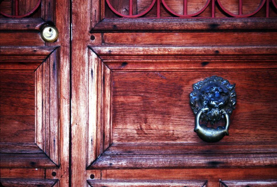 Free Image of Knocker on old wooden door 