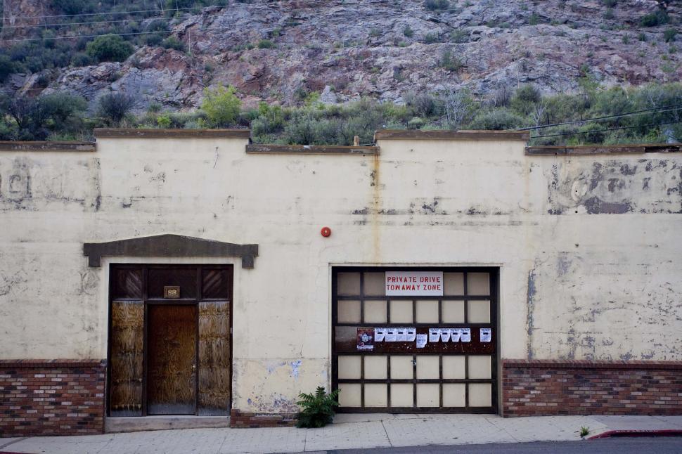 Free Image of Old run down garage entry 