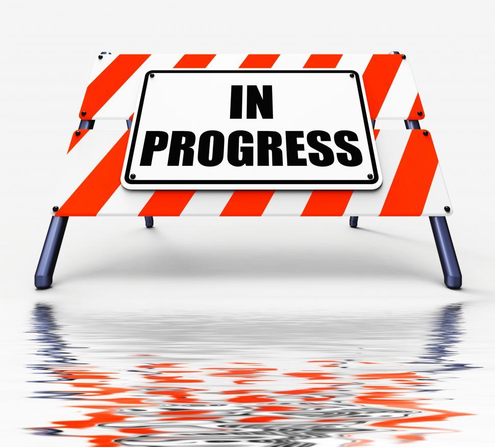 Free Image of In Progress Sign Displays Ongoing or Happening Now 