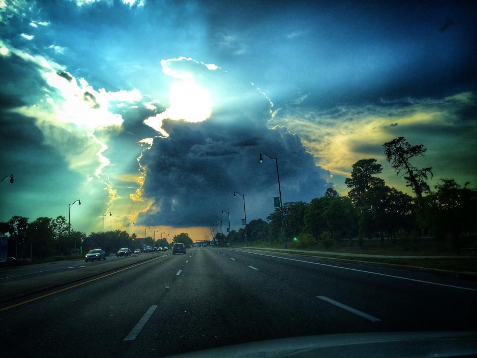 Free Image of Stormclouds Fight Sunrays  
